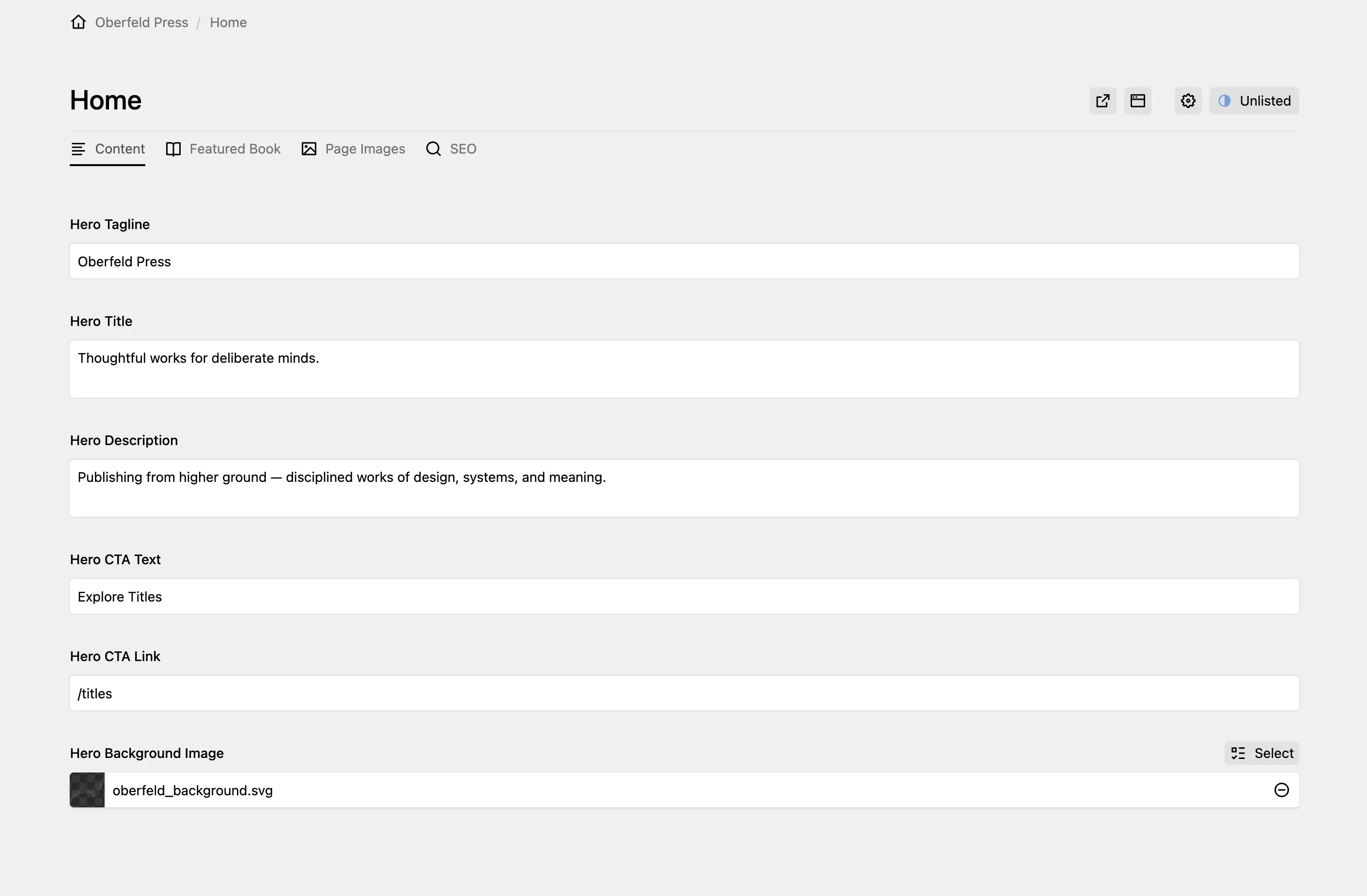 Panel page for "Home" showing hero tagline, title, description and CTA fields with a files field for a background image, organized across Content, Featured Book, Page Images and SEO tabs.